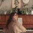 happy woman playin the piano feat