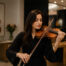 Beautiful lady playing violin
