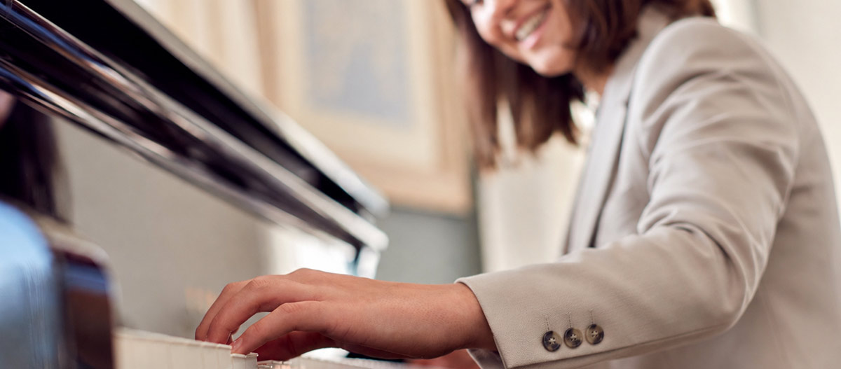 Professional woman enjoying music as a creative interest beyond her career